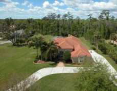 Beautiful Paradise! Waterfront! Over 3.8 acres! No detail overlooked Full electric to boat dock.  Perfect home. Custom lighting,ext also. Beautiful 