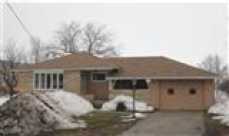 All New Carpet and Vinyl in this Cozy Ranch Home. Freshly Painted, New Bathroom and New Countertops in Kitchen. Living Room, Dining Room, Eat-in Kitchen, 3 Bedrooms and Bath on Main. Family Room with Electric Fireplace and Laundry in Basement. Hardwood Floors. Patio-Breezeway and 1 Car Attached Garage.